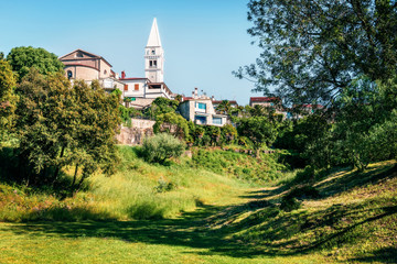 Sunny morning view of Saint Martin's church. Splendid spring cityscape of small town in Istria,...