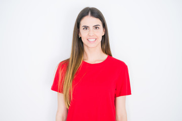 Obraz premium Young beautiful woman wearing casual red t-shirt over white isolated background with a happy and cool smile on face. Lucky person.