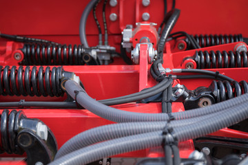 Industrial springs on agricultural transportation and equipment