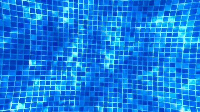 Blue bottom view of pool with sunlight reflections