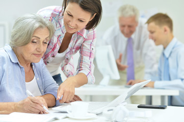Fototapeta premium Portrait of group of successful business people working