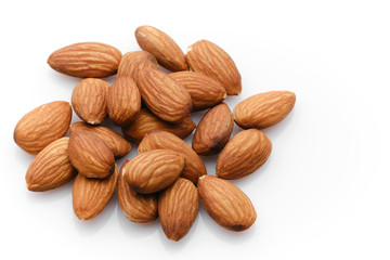 almonds isolated on white background close up. macro shot