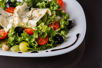 Salad provence. Mix lettuce tomato grape olive and blue cheese