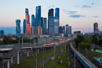 Fototapeta na wymiar Moscow City, business district of skyscrapers at dusk, roads around it, Moscow, Russia