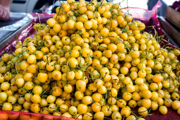 Sweet cherry background. Close-up of a beautiful ripe sweet cherry.