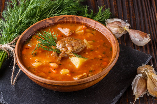 Chanahi a traditional Georgian meat stew in a bowl on stoyn board