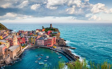 One of the five towns that make up the Cinque Terre region - Vernazza. Aerial spring view of Liguria, Italy, Europe. Splendid seascape of Mediterranean sea. Traveling concept background.