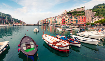 Splendid morning view of Portovenere town. Colorful spring seascape of Mediterranean sea,  Liguria, province of La Spezia, Italy, Europe. Traveling concept background.
