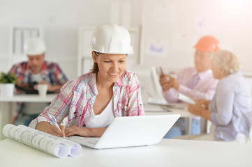 Portrait of group of business people, architects working