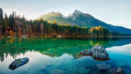 Exciting autumn view of Hintersee lake. Amazing morning panorama of Bavarian Alps on the Austrian...