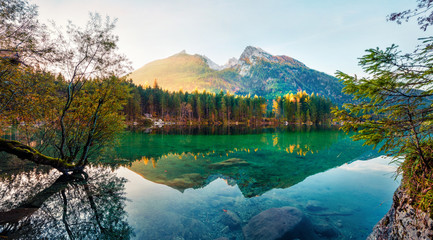 Bright autumn view of Hintersee lake. Fantastic morning scene of Bavarian Alps on the Austrian border, Germany, Europe. Beauty of nature concept background. Orton Effect.