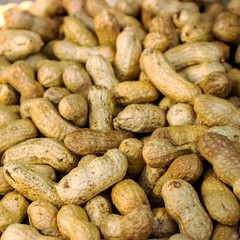 Peanut background food. peanuts in shell texture. Close-up of peanuts in shkarlupe view from above.