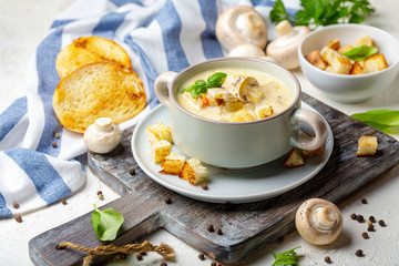 Chicken cream soup with mushrooms.