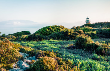 Beautiful morning view of Skinari Lighthouse. Bright spring scene of Zakynthos island, Korithi...