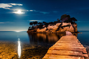 Fantastic night view of the Cameo Island. Great spring scene on the Port Sostis, Zakynthos island,...