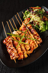 fish kebabs with fresh salad