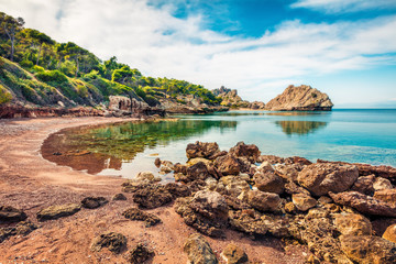 Beautiful spring panorama of cozy beach in northeastern Corinthia, Greece. Sunny outdoor scene of...
