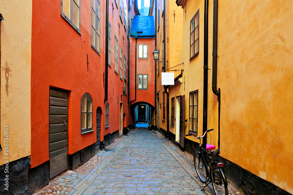 Canvas Prints stockholm street in the old town, gamla stan with archway and bicycle, sweden