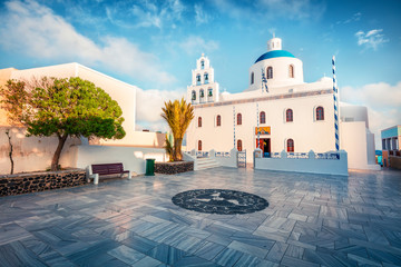 Spectacular morning view of Santorini island. Colorful spring sc ene of the famous Greek resort...