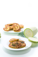vegetable fritters made from green zucchini in a plate