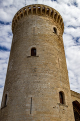 Fototapeta na wymiar Tower of Castle Castel de Bellver in Palma on balearic island Mallorca, Spain on a sunny day