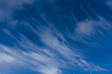 Fototapeta na wymiar Beautiful forms of clouds on blue sky
