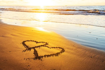 Couple hearts on sea beach. Valentine day and love concept
