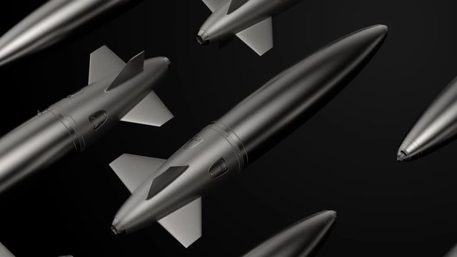   3d loopable render of missile. Pattern made of repetitive metal missiles or bomb shapes. Military theme.