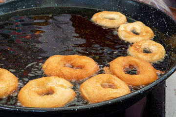 Preparation of pancake donuts, typical of Amorebieta, Biscay, Spain