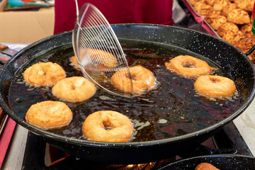 Preparation of pancake donuts, typical of Amorebieta, Biscay, Spain