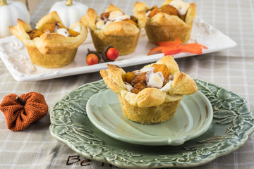 Puff pastry cup filled with pumpkin.