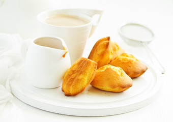 Madeleine french cookies with caramel. selective focus.