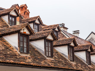 Ljubljana, Slovenia, August 5, 2019. fragment of the roof of the old building in the historical...