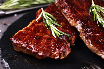 Barbecue Rib Eye Steak or rump steak - Dry Aged Wagyu Entrecote Steak on rustic background