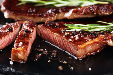 Barbecue Rib Eye Steak or rump steak - Dry Aged Wagyu Entrecote Steak on rustic background