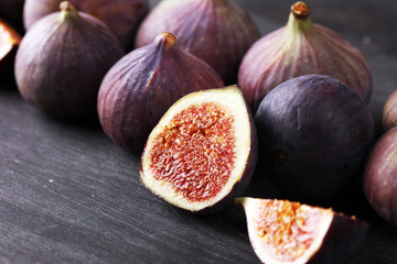Fresh figs. Food Photo. whole and sliced figs on beautiful rustic background.