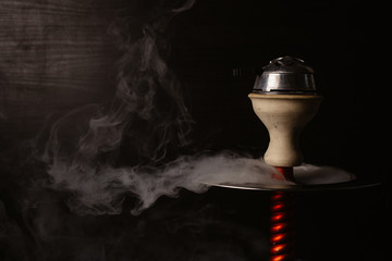  mine hookah with a bowl and colaud on a black background and a lot of smoke