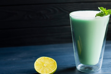 milk cocktail with mint and lemon