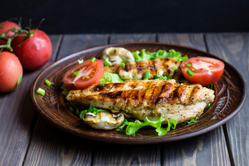 grilled chicken fillet tomatoes and mushrooms