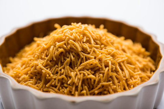 Aloo Bhujiya or Potato Bhujia also known as Namkeen sev. Popular Bikaneri recipe served in a bowl or plate. selective focus