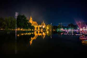 Fototapeta premium Decorative castle Vajdahunyad in the historical park Varoshliget at night, Budapest, Hungary. The Millennium of the Hungarian State, 1896