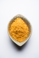 Aloo Bhujiya or Potato Bhujia also known as Namkeen sev. Popular Bikaneri recipe served in a bowl or plate. selective focus