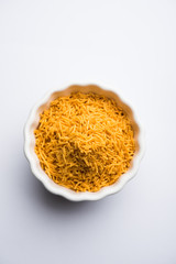 Aloo Bhujiya or Potato Bhujia also known as Namkeen sev. Popular Bikaneri recipe served in a bowl or plate. selective focus