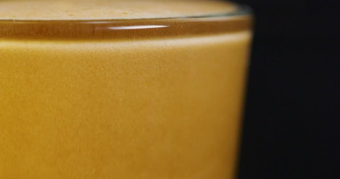 Macro video of strong espresso from exclusive coffee machine