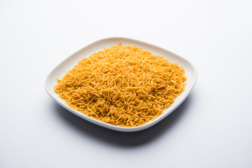 Aloo Bhujiya or Potato Bhujia also known as Namkeen sev. Popular Bikaneri recipe served in a bowl or plate. selective focus