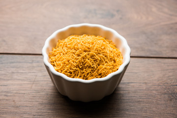 Aloo Bhujiya or Potato Bhujia also known as Namkeen sev. Popular Bikaneri recipe served in a bowl or plate. selective focus