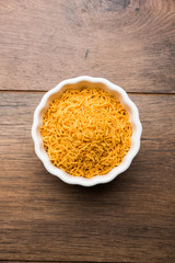 Aloo Bhujiya or Potato Bhujia also known as Namkeen sev. Popular Bikaneri recipe served in a bowl or plate. selective focus