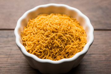 Aloo Bhujiya or Potato Bhujia also known as Namkeen sev. Popular Bikaneri recipe served in a bowl or plate. selective focus