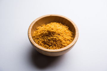 Aloo Bhujiya or Potato Bhujia also known as Namkeen sev. Popular Bikaneri recipe served in a bowl or plate. selective focus