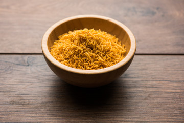Aloo Bhujiya or Potato Bhujia also known as Namkeen sev. Popular Bikaneri recipe served in a bowl or plate. selective focus